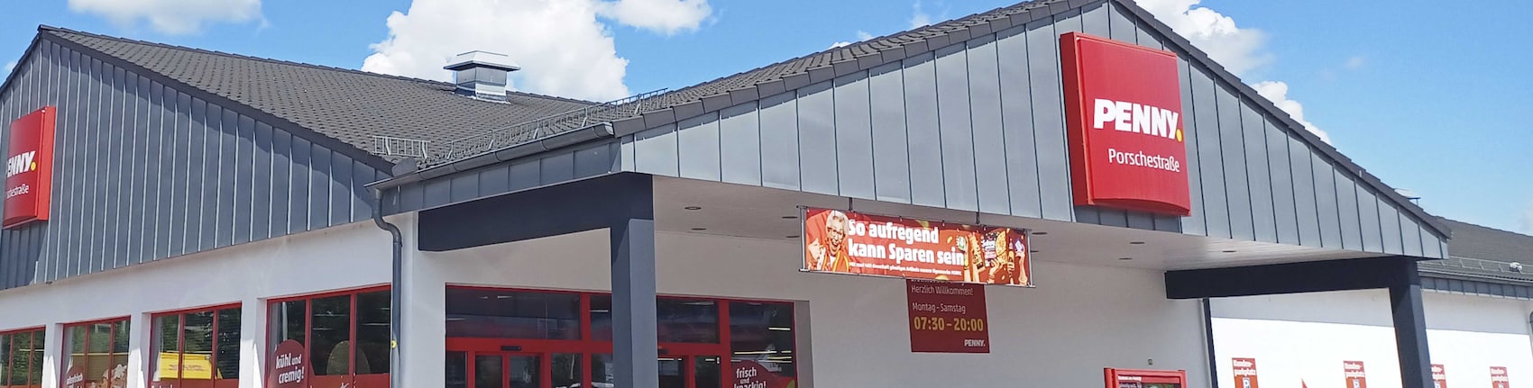 Sie sehen den Eingang vom Penny Markt in Landshut, Porschestr. 24