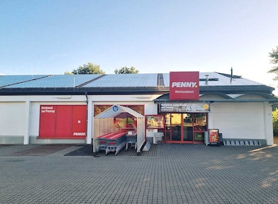 Sie sehen den Eingang vom Penny Markt in Rheinzabern, Rülzheimer Str. 1