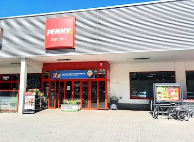 Sie sehen den Eingang vom Penny Markt in Wandlitz Prenzlauer Chaussee 116/ Breitschei