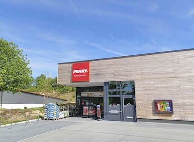 Sie sehen den Eingang vom Penny Markt in Ruhmannsfelden, Schulstraße 71