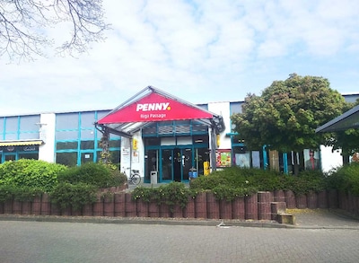 sie sehen den Eingang vom Penny Markt in Rostocker Str. 116