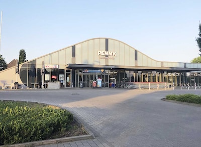 Sie sehen den Eingang vom Penny Markt in Werne, An Den 12 Bäumen 8