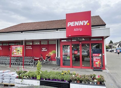Sie sehen den Eingang vom Penny Markt in Altrip, Slevogtweg 11-17/Dalbergstr.