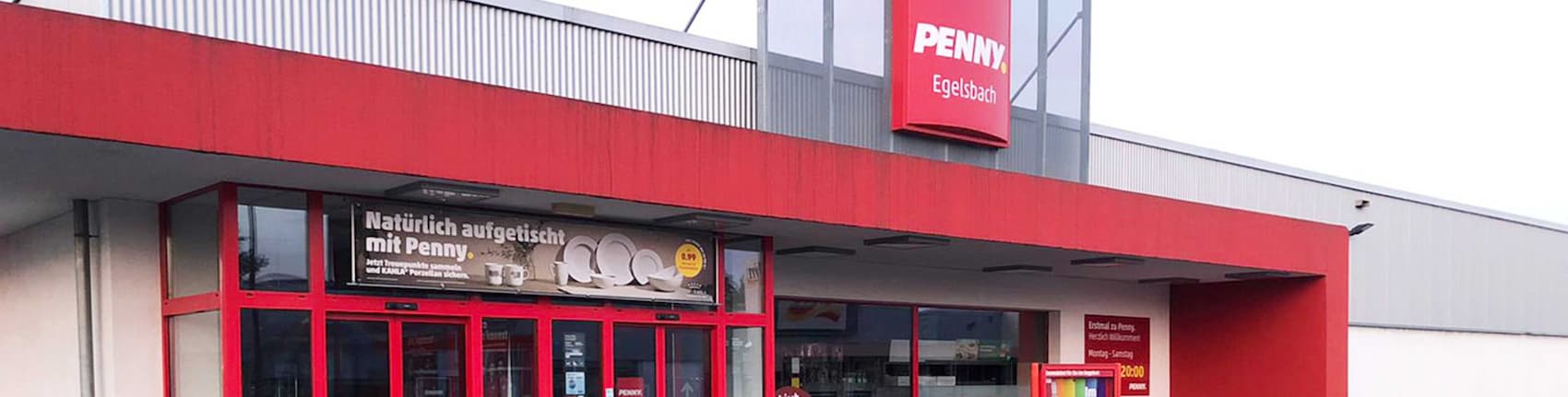 Sie sehen den Eingang vom Penny Markt in Egelsbach, Kurt-Schumacher-Ring 1