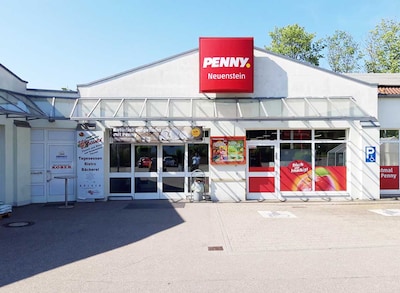 Sie sehen den Eingang vom Penny Markt in Neuenstein, Kirchensaller Str. 27