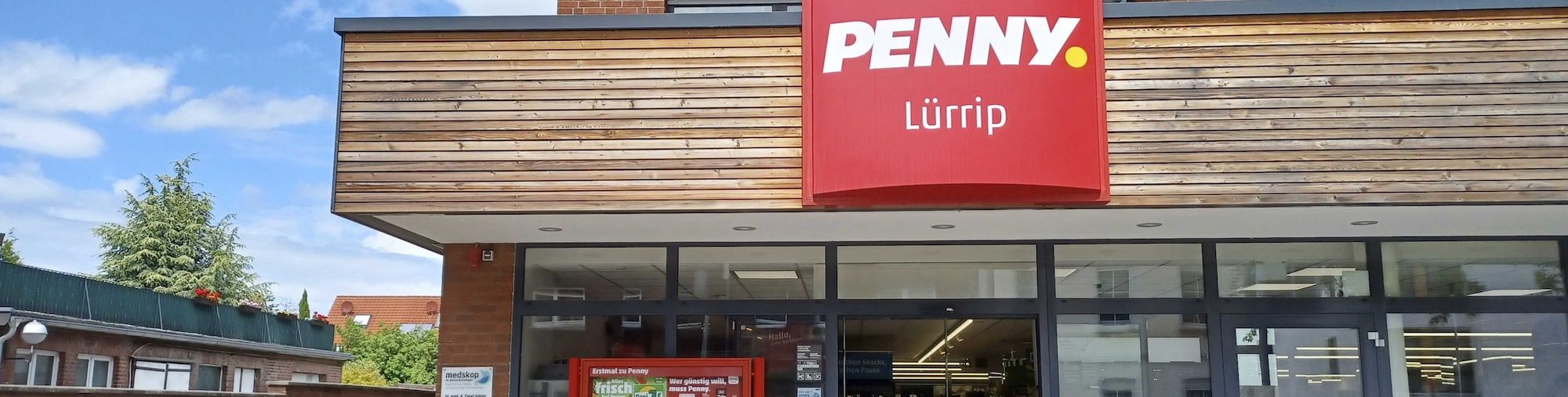 Sie sehen den Eingang vom Penny Markt Mönchengladbach Neusser Str. 307