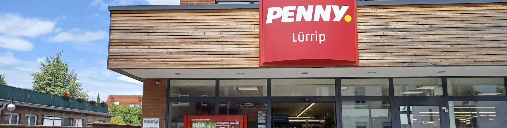Sie sehen den Eingang vom Penny Markt Mönchengladbach Neusser Str. 307
