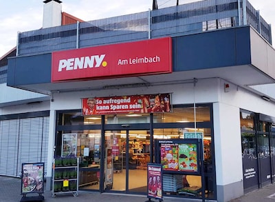 sie sehen den Eingang vom Penny Markt in Nußloch Massengasse 48