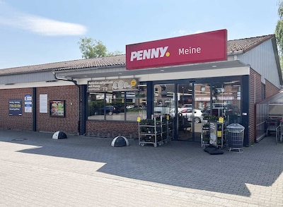 Sie sehen den Eingang vom Penny Markt in Meine, Hauptstr. 24A
