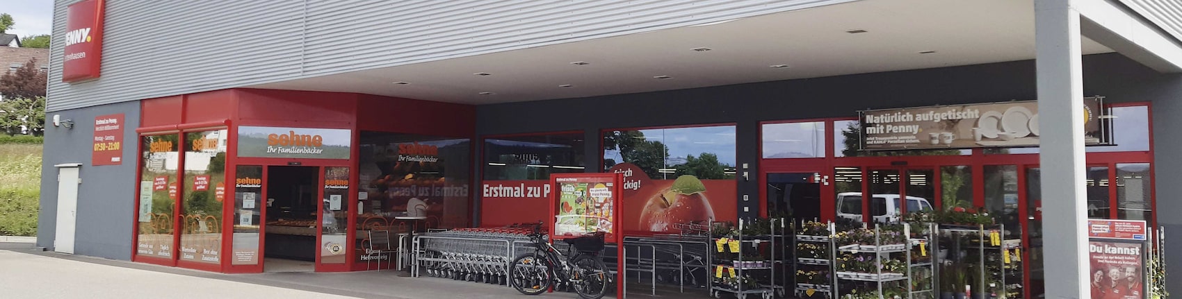 Sie sehen den Eingang vom Penny Markt in Dettenhausen, Breitwasenring 58/1