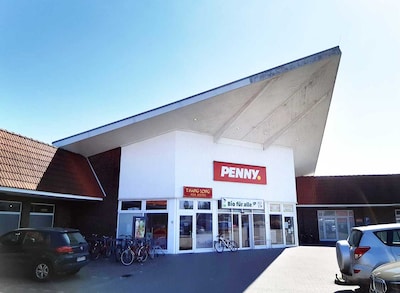 sie sehen den Eingang vom Penny Markt in Roevershagen Rosengrund 1-2