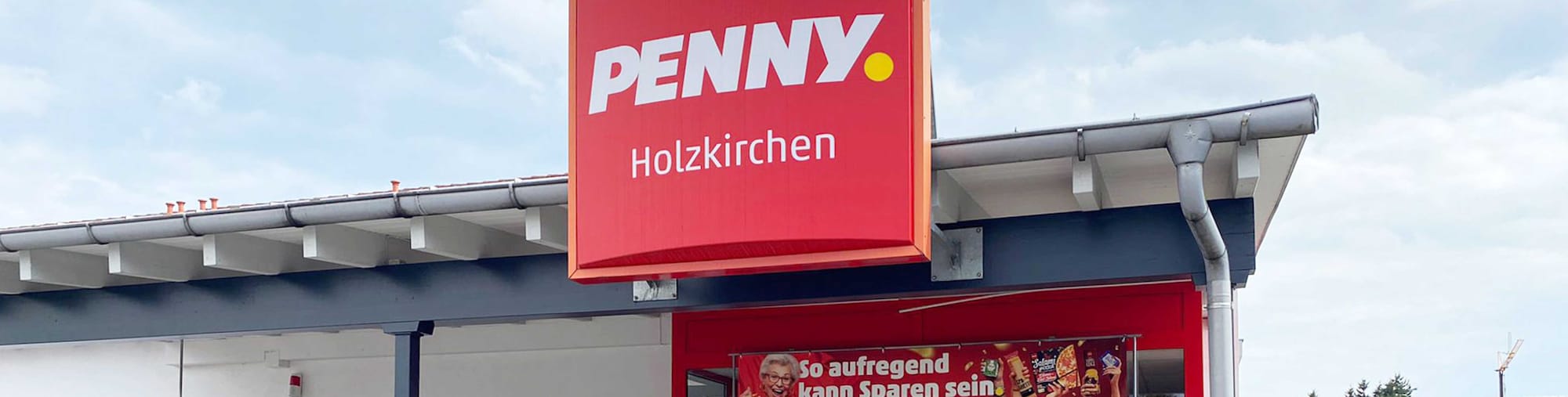 Sie sehen den Eingang vom Penny Markt in Holzkirchen, Industriestr. 35