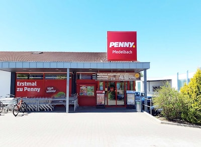 Sie sehen den Eingang vom Penny Markt in Pfedelbach, Allmendstr. 14