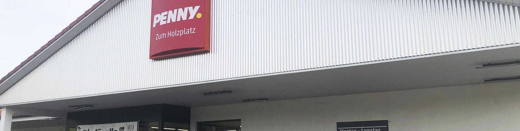 Sie sehen den Eingang vom Penny Markt in Sassenburg, Zum Holzplatz 2