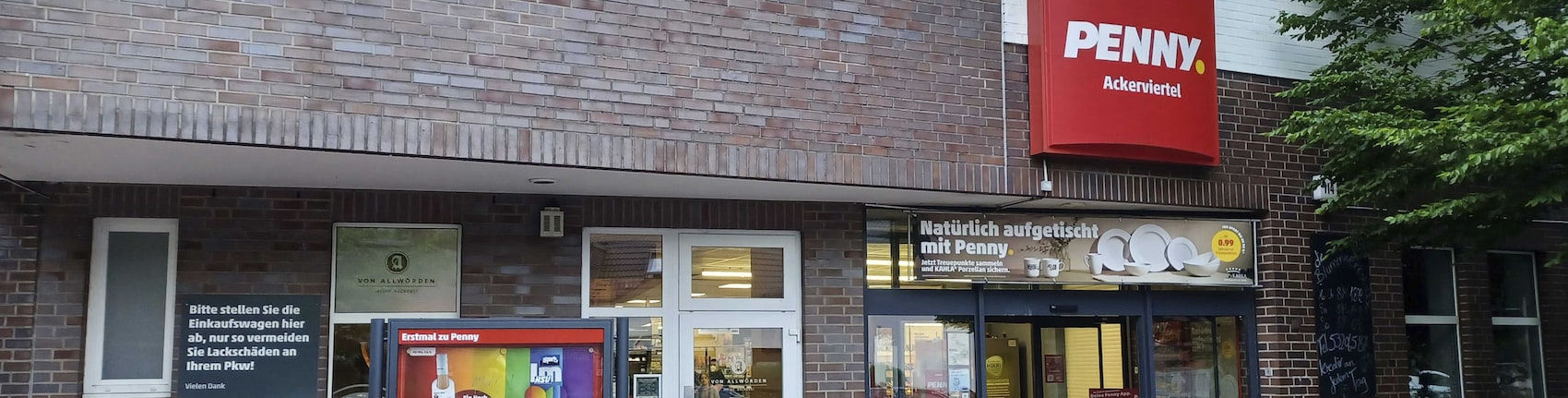 Sie sehen den Eingang vom Penny Markt in Hamburg/Eidelstedt, Pinneberger Chaussee 114