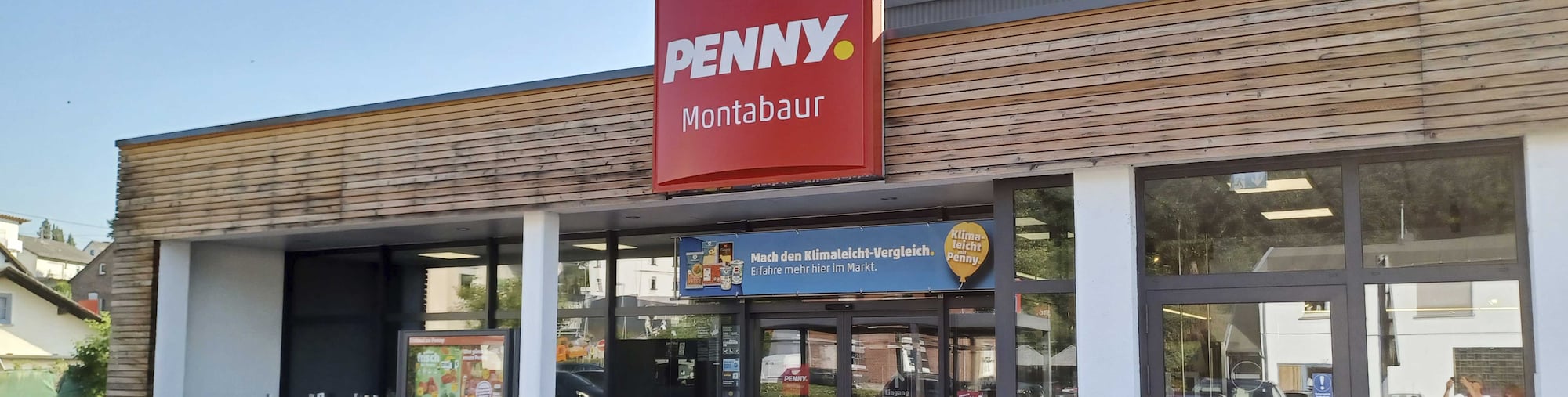 Sie sehen den Eingang vom Penny Markt in Montabaur Alleestrasse 16d