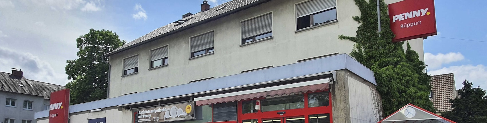 Sie sehen den Eingang vom Penny Markt in Karlsruhe/Rueppurr, Frauenalber Str. 2