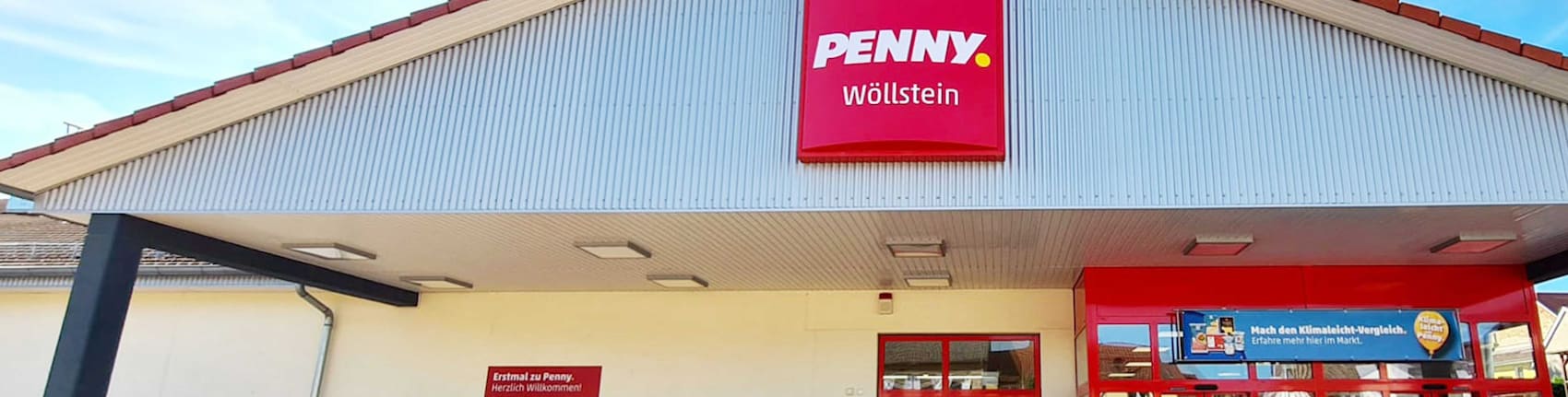Sie sehen den Eingang vom Penny Markt in Woellstein, Ernst-Ludwig-Str. 13