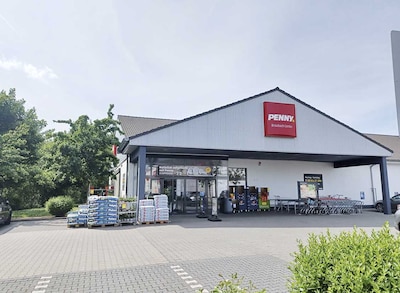 Sie sehen den Eingang vom Penny Markt in Maintal/Doernigheim Braubachstr. 18