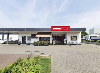 Sie sehen den Eingang vom Penny Markt in Rastatt, Biblisweg 6 A