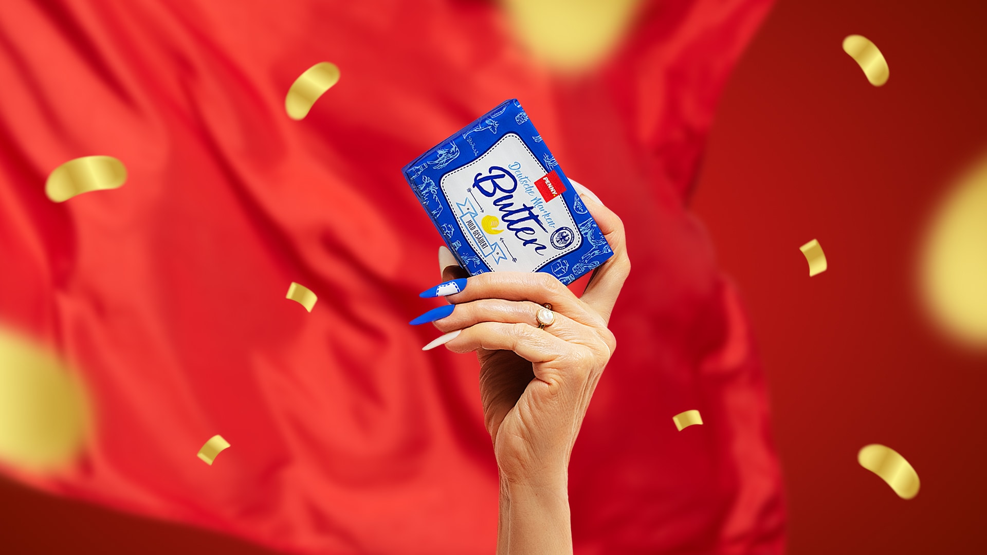 Fan-Hand mit PENNY Butter