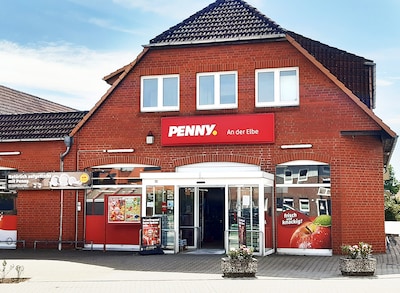 Sie sehen den Eingang vom Penny Markt in Bleckede, Bahnhofstr. 1