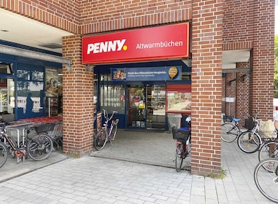 Sie sehen den Eingang vom Penny Markt in Isernhagen, Bothfelder Str. 23