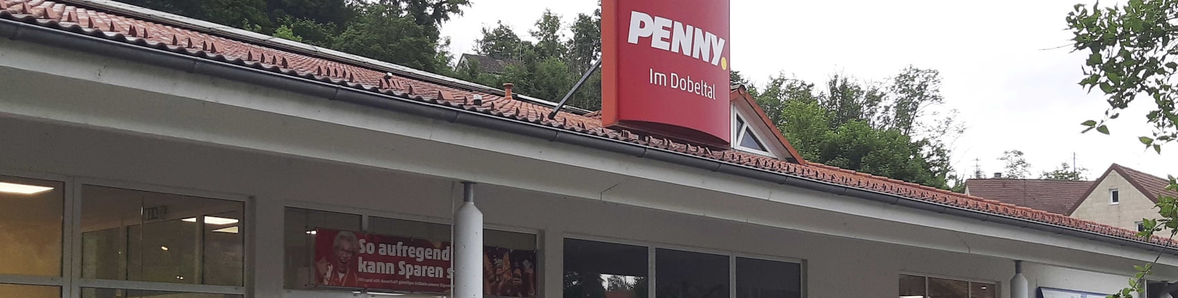 Sie sehen den Eingang vom Penny Markt in Zwiefalten, Hauptstr. 2/1
