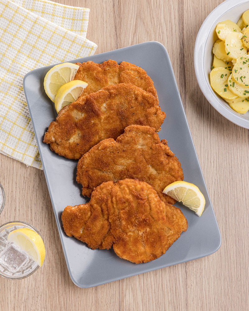 Das Bild zeigt die fertigen panierten Putenschnitzel.