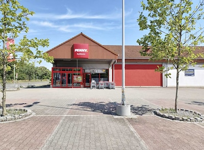 Sie sehen den Eingang vom Penny Markt in Dettenheim/Russheim, Liedolsheimer Str. 27