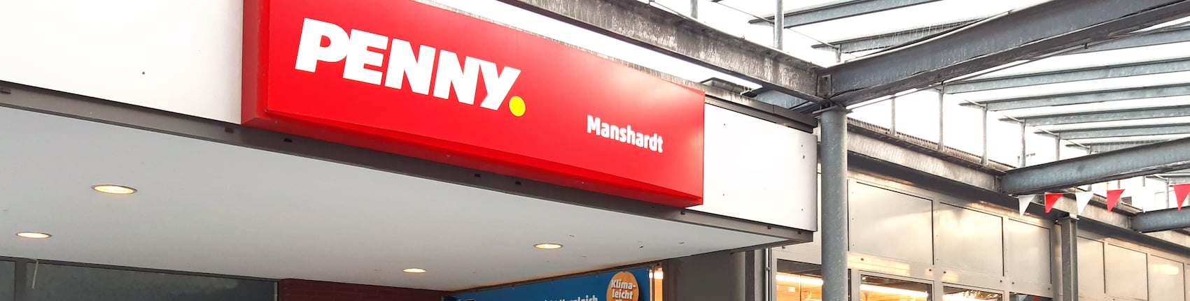 Sie sehen den Eingang vom Penny Markt in Hamburg/Horn, Manshardtstr. 113B