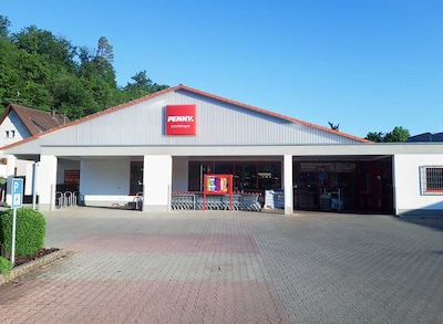 Sie sehen den Eingang vom Penny Markt in Schelklingen Am Manzenbuehl  4