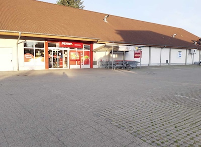 Sie sehen den Eingang vom Penny Markt in Jockgrim, Buchstr. 13