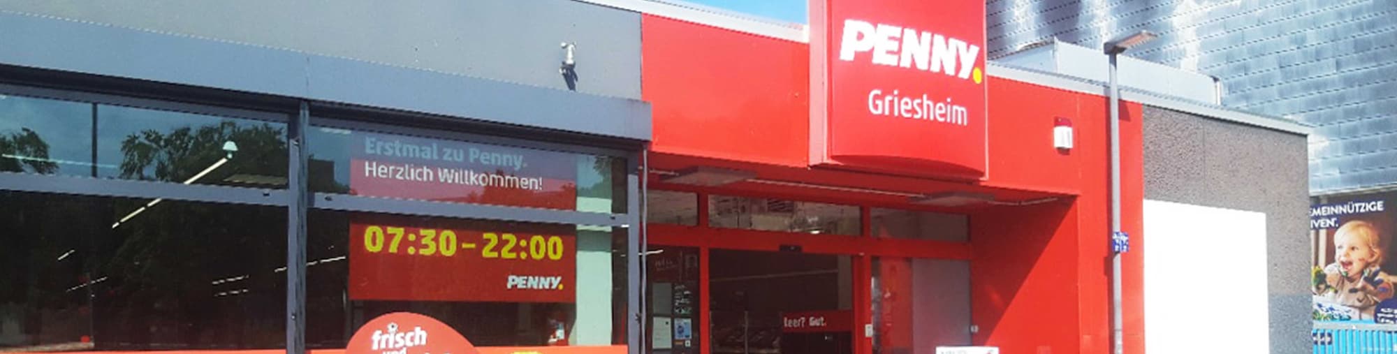 Sie sehen den Eingang vom Penny Markt in Frankfurt/Griesheim, Waldschulstr. 1