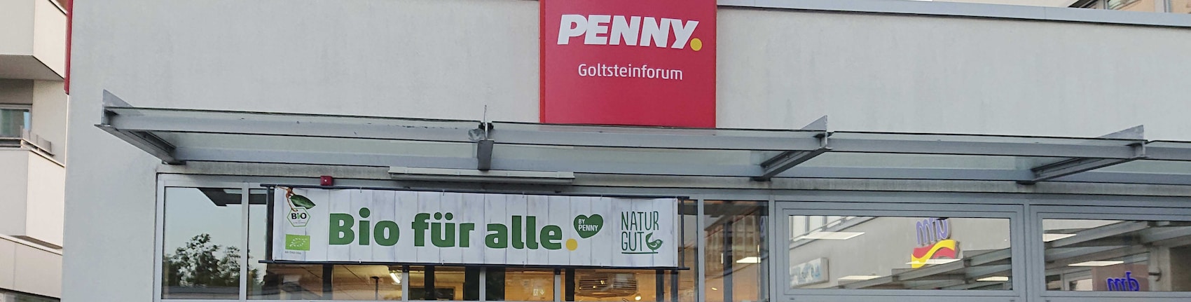 Sie sehen den Eingang vom Penny Markt in Köln – Bayental Goltsteinstr. 91