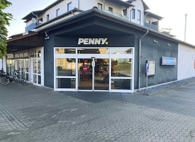 Sie sehen den Eingang vom Penny Markt in Rahden, Lemfoerder Str. 21
