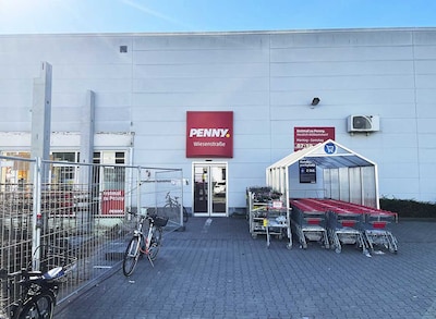 Sie sehen den Eingang vom Penny Markt in Viernheim, Wiesenstr. 71A