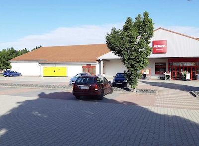 Sie sehen den Eingang vom Penny Markt in Wabern, Alte Kasseler Strasse 15