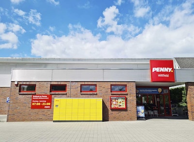 Sie sehen den Eingang vom Penny Markt in Seevetal/Hittfeld, Bahnhofstr. 17