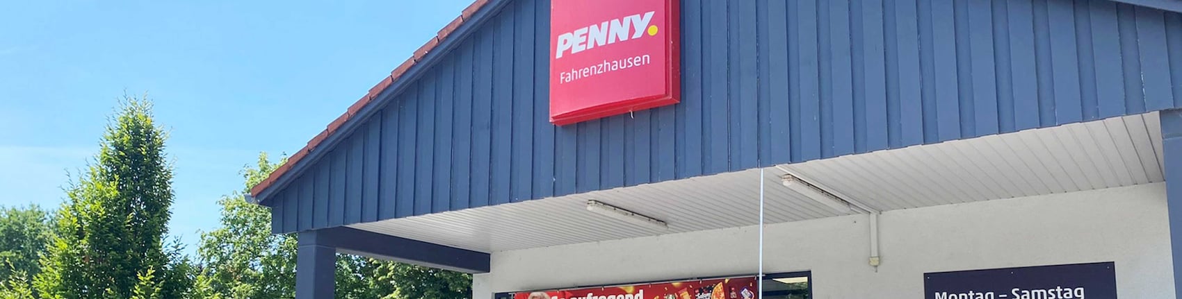 Sie sehen den Eingang vom Penny Markt in Fahrenzhausen, Am Fischfeld 1