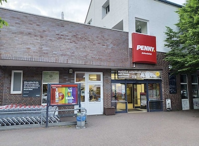 Sie sehen den Eingang vom Penny Markt in Hamburg/Eidelstedt, Pinneberger Chaussee 114