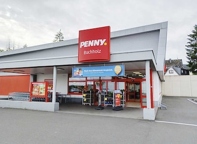 Sie sehen den Eingang vom Penny Markt in Boppard – Buchholz Casinstr. 60/Hunsrueckhoehenstr.