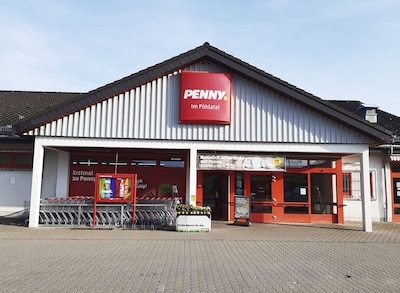 Sie sehen den Eingang vom Penny Markt in Koenigswalde Gewerbegebiet 1