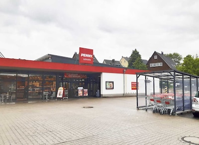 Sie sehen den Eingang vom Penny Markt in Iserlohn, Hagener Str. 92a