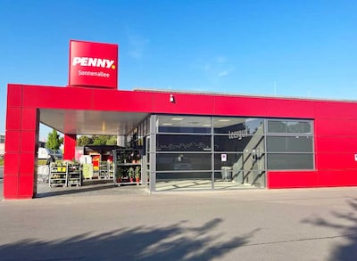Sie sehen den Eingang vom Penny Markt in Pulheim, Sonnenallee 7