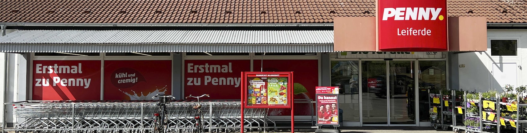 Sie sehen den Eingang vom Penny Markt in Leiferde, Gilder Weg 39