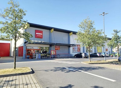 Sie sehen den Eingang vom Penny Markt in Moerfelden-Walldorf, Farmstr. 101