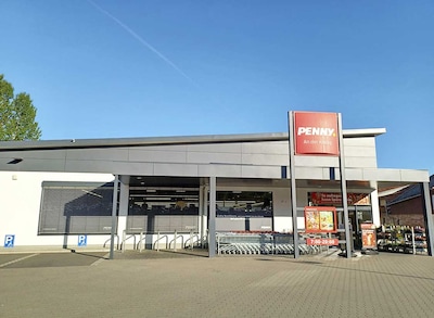 Sie sehen den Eingang vom Penny Markt in Sinntal Schlüchterner Str. 29