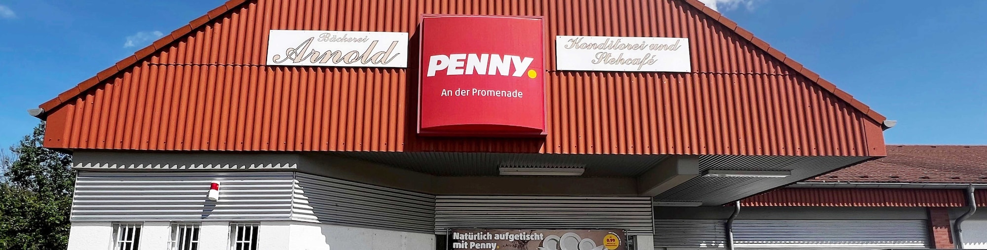 Sie sehen den Eingang vom Penny Markt in Lommatzsch Jessener Str. 2