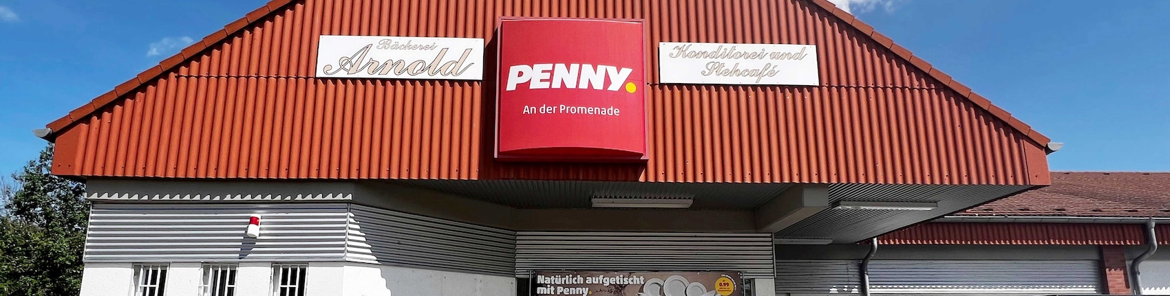 Sie sehen den Eingang vom Penny Markt in Lommatzsch Jessener Str. 2